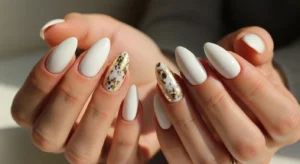 White Nails with Gold Foil Accents