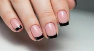 Black French Tips on a Nude Base