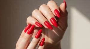 Glossy Red Stiletto Nails