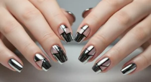 Chrome nails with negative space and modern geometric design