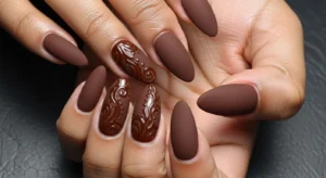 Matte and glossy chocolate nails on dark skin