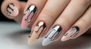 Chrome drip nail design with liquid metallic effect