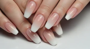 Ombre almond nails soft gradient design on dark skin