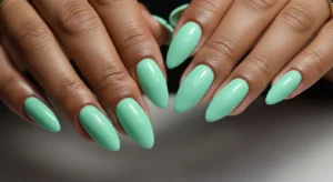 Mint green almond nails modern look for Black women
