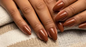 Chocolate brown almond nails on dark skin elegant fall look
