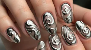 Chrome swirl nail art with soft curved metallic lines