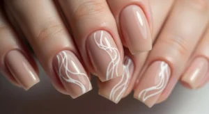 Nude Nails with White Swirls