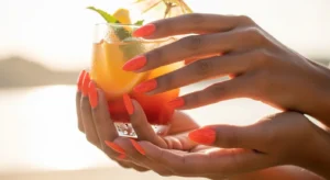 Coral almond nails bright and flattering on dark skin