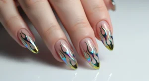 Chrome flame nail design on nude base with metallic accents