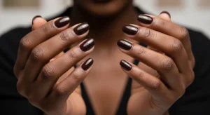 Espresso brown nails on dark skin for a deep fall manicure