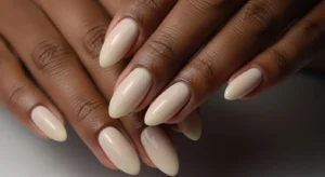 Beige almond nails simple everyday look on dark skin