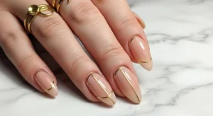 Gold accent nails elegant winter nail design