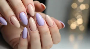 purple and nude nails combination creating soft contrast for everyday manicure