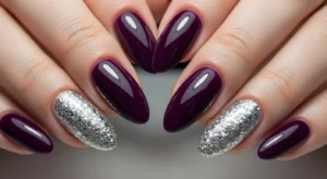 purple nails with glitter accent for subtle sparkle and festive manicure style
