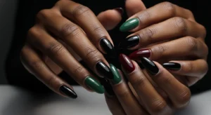 Dark nail colors like black burgundy and green on dark skin