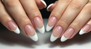 almond french tip acrylic nails creating elongated and elegant nail shape