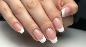 french tip nails with natural base and white tips for timeless manicure