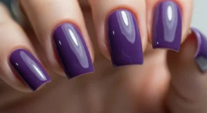 glossy purple square nails creating structured and modern manicure style