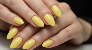 glossy yellow almond nails