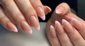 pink french tip acrylic nails for soft and feminine manicure look
