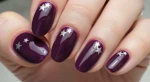 purple nails with star design for cute and trendy nail art look