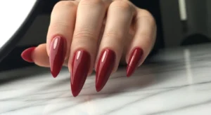 lipstick nail shape with diagonal tip for trendy and unique manicure style