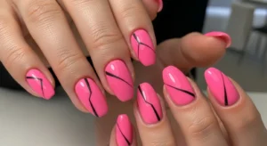 Short pink nails with black minimal line design