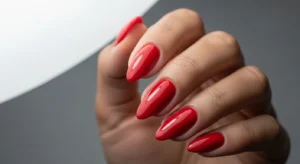 Red nails bold classic look on dark skin