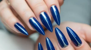 edge nail shape with central ridge creating unique angular manicure design