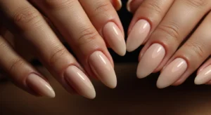 Beige almond nude nails elegant nail shape for dark skin