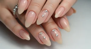 Nude nails with rhinestones homecoming nail idea