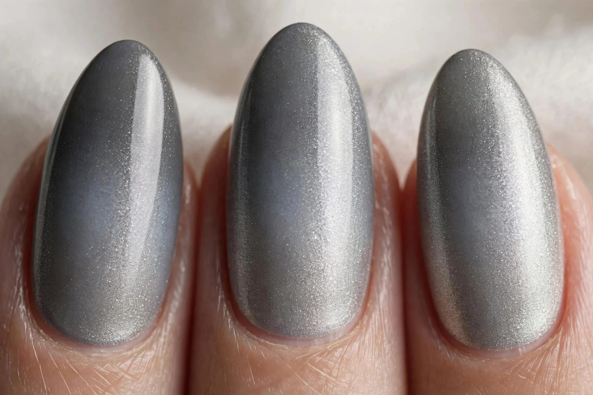 Grey to silver ombr&eacute;, almond nails