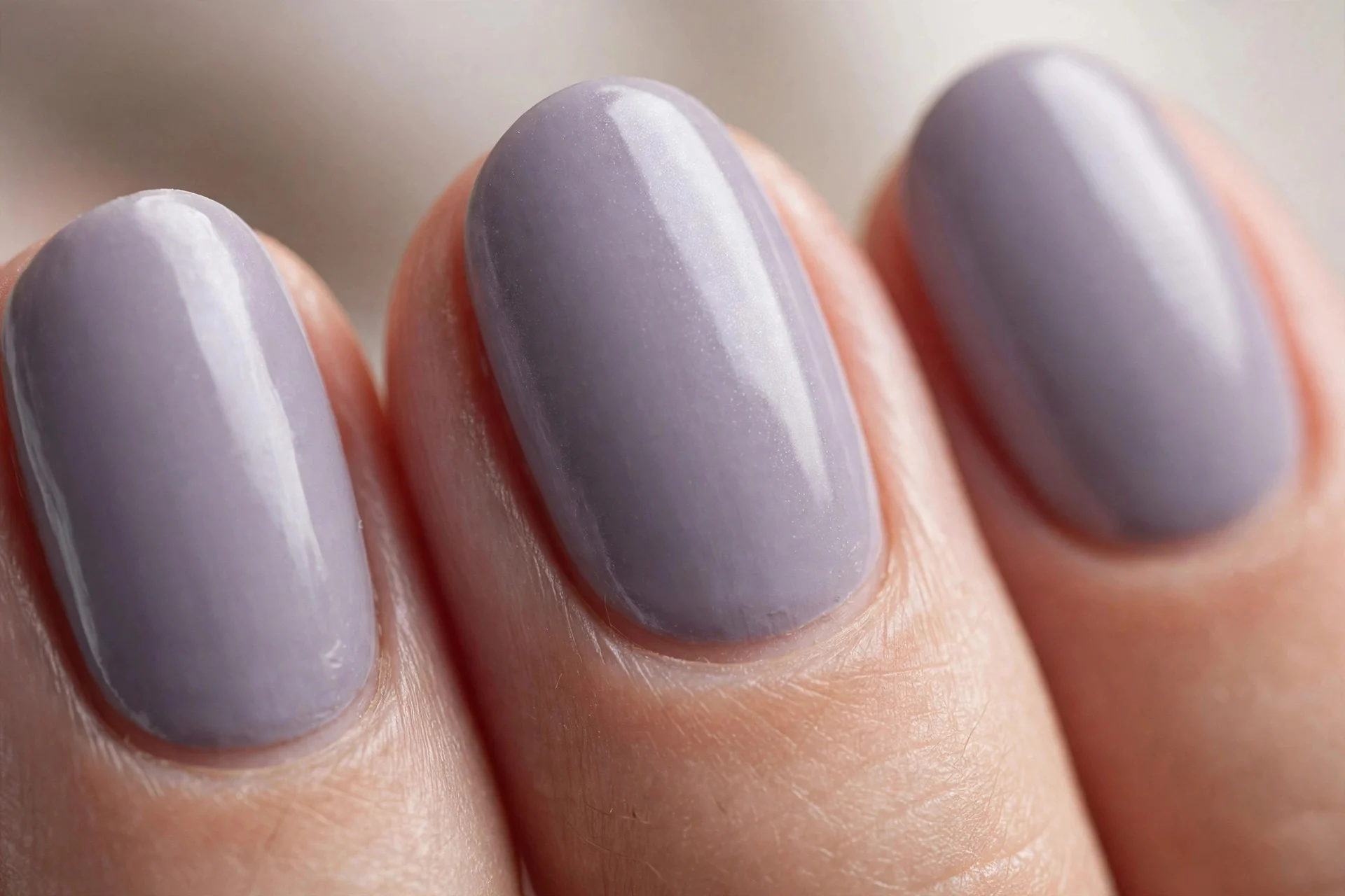 Lavender grey polish, oval nails