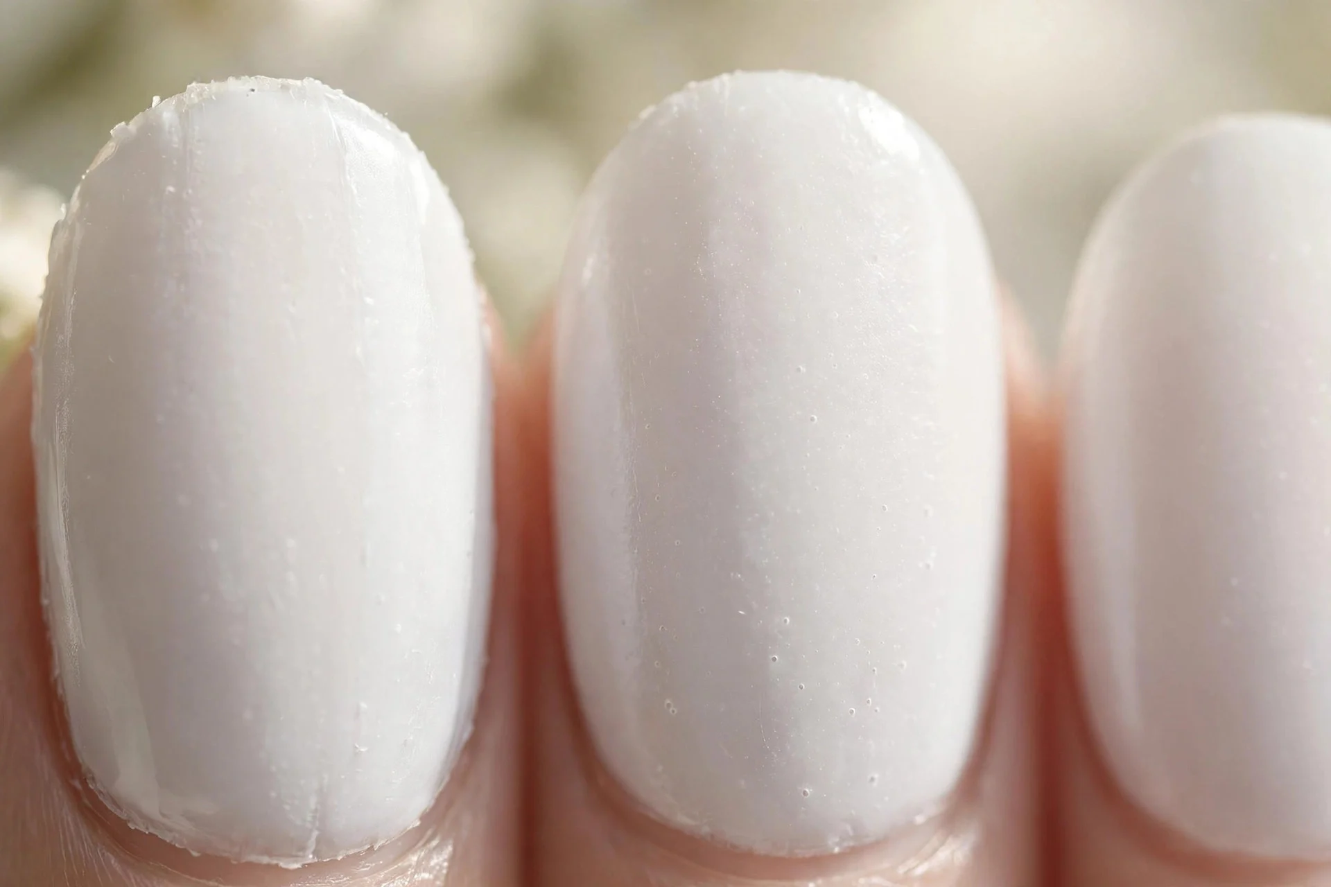 Milky porcelain white polish, oval nails