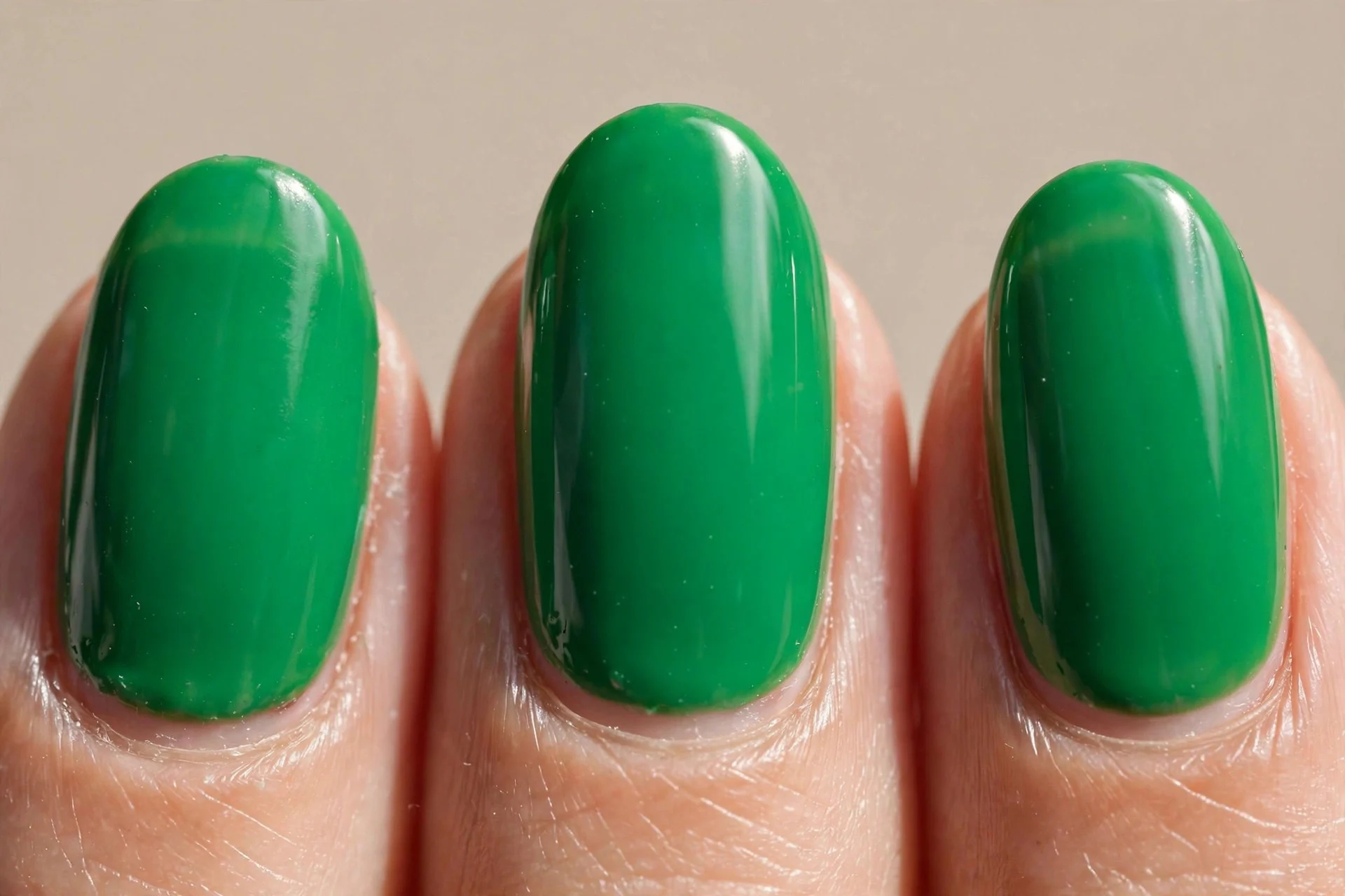 Vivid saturated emerald creme, gloss, short almond.