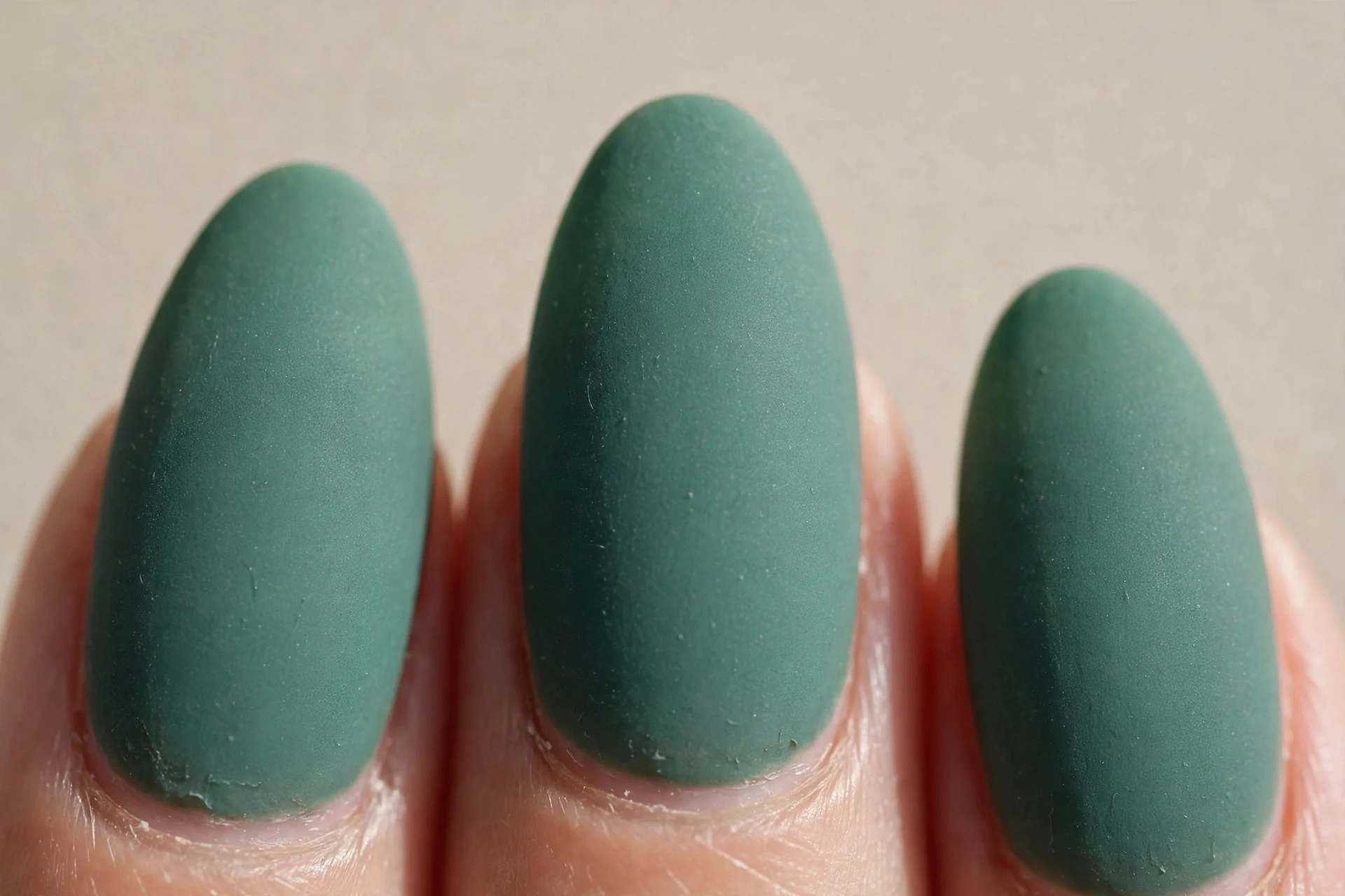 Dusty emerald, matte finish, medium almond.