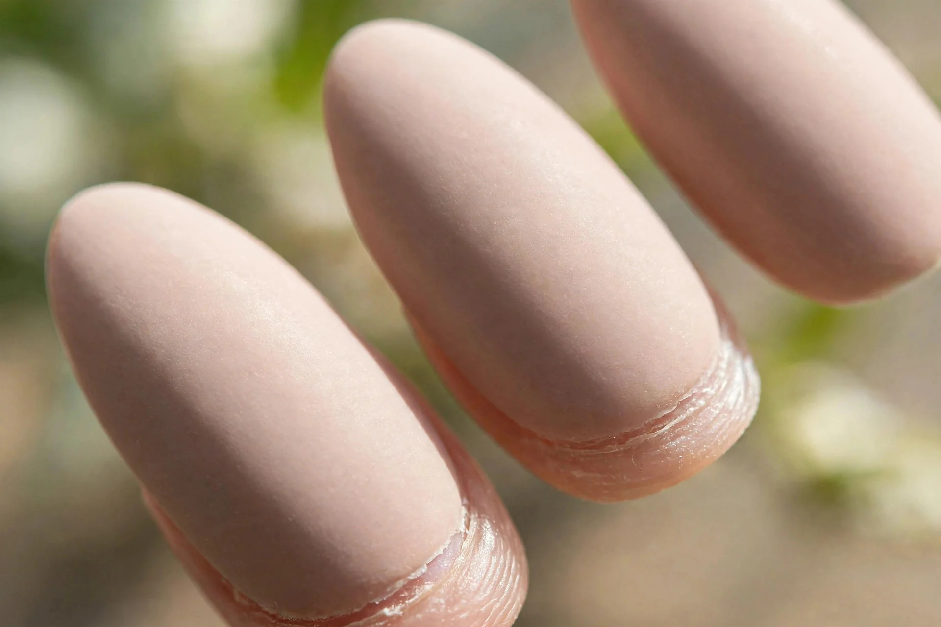 almond nails in matte nude gel polish