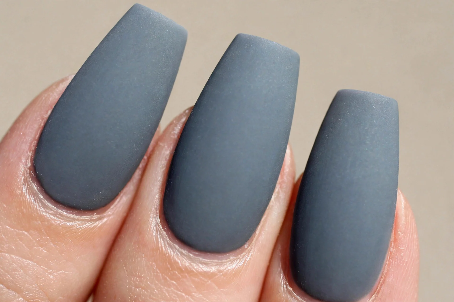 medium coffin nails, matte slate-grey polish, flat velvety finish