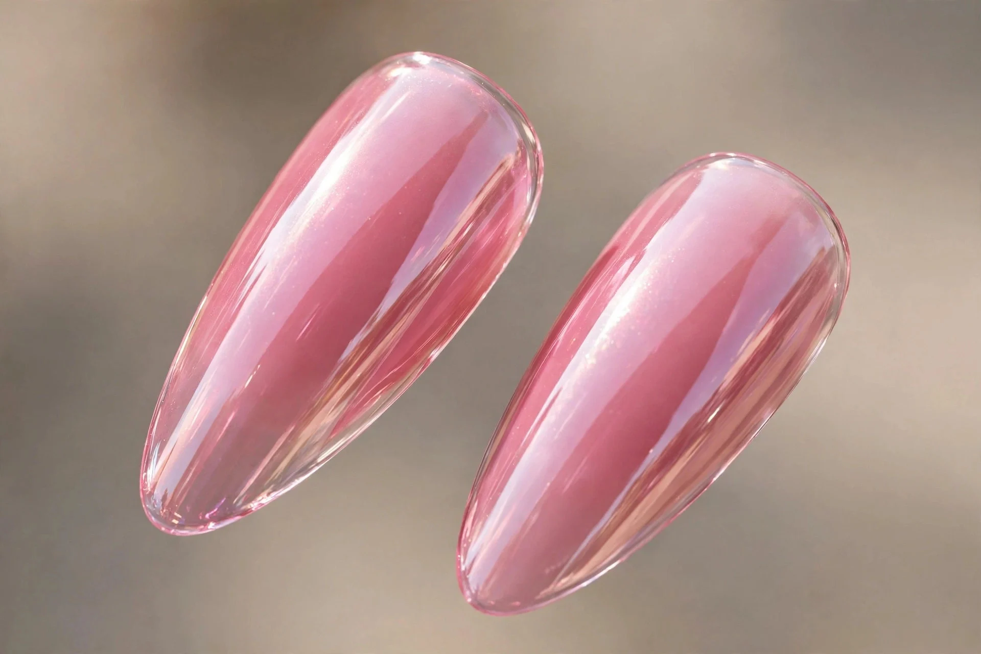Extreme macro of two long almond fingernails in glossy jelly pink chrome, elegant curve