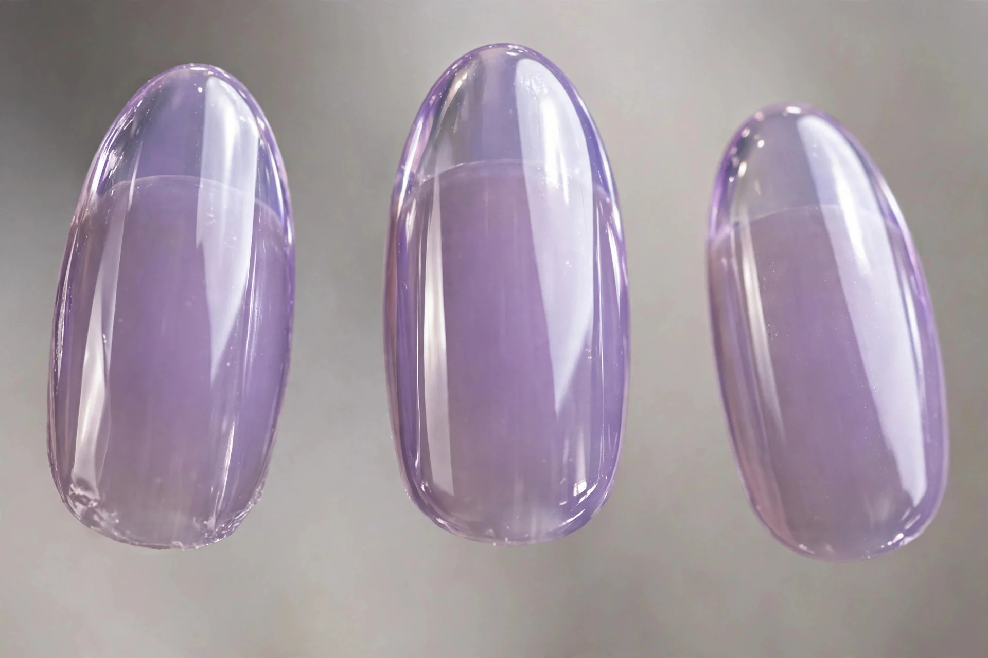 Translucent lavender jelly nails with chrome glaze, medium almond, glassy