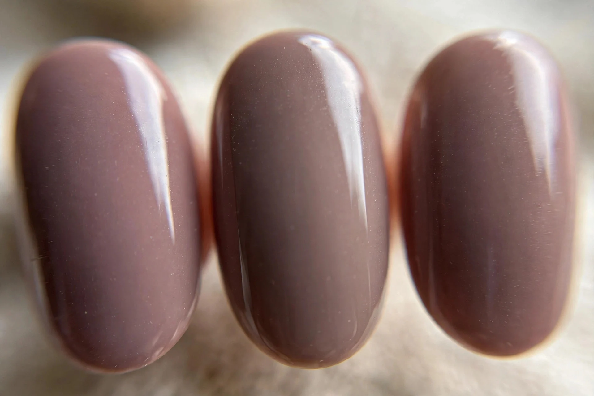 Mushroom mauve polish, oval nails