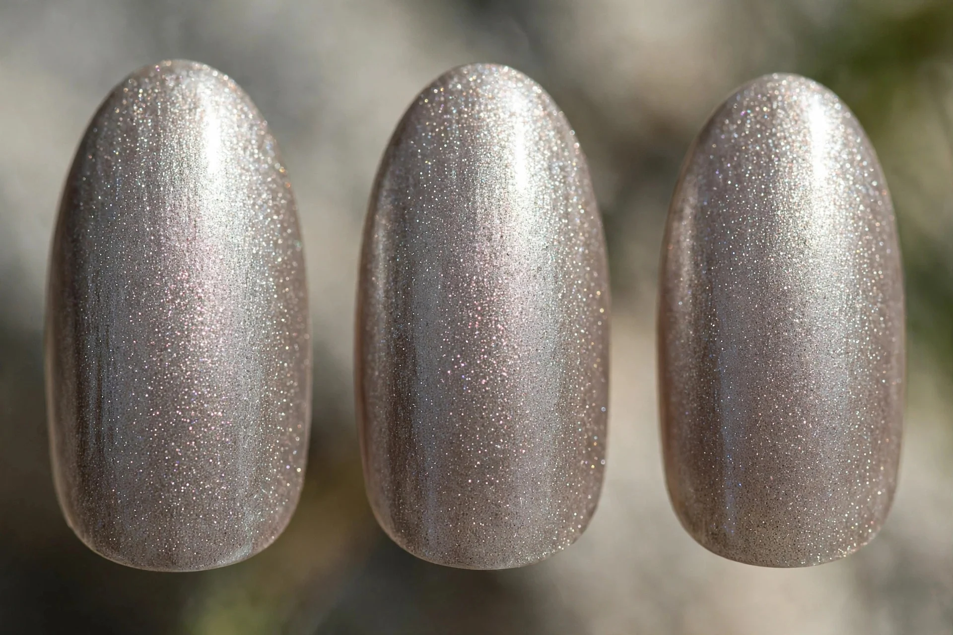 Silver-taupe shimmer polish, almond nails