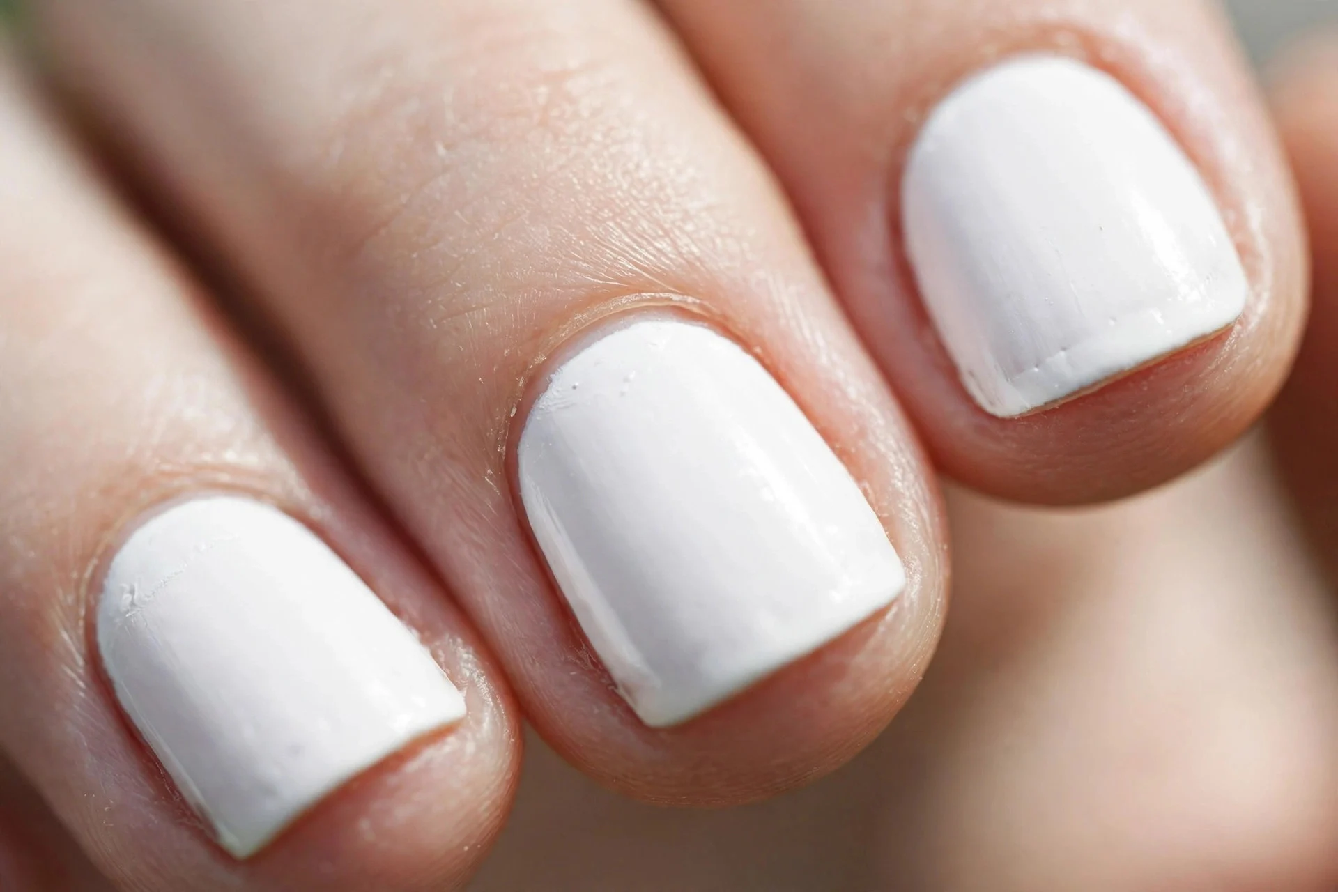 short squoval nails in crisp bright white