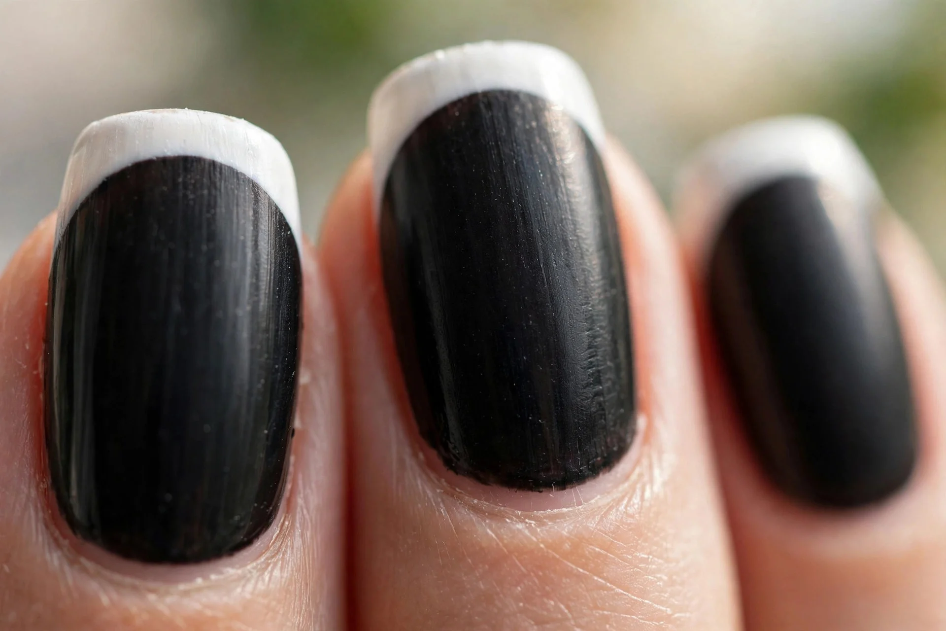 tuxedo nails with black base and crisp white French tips