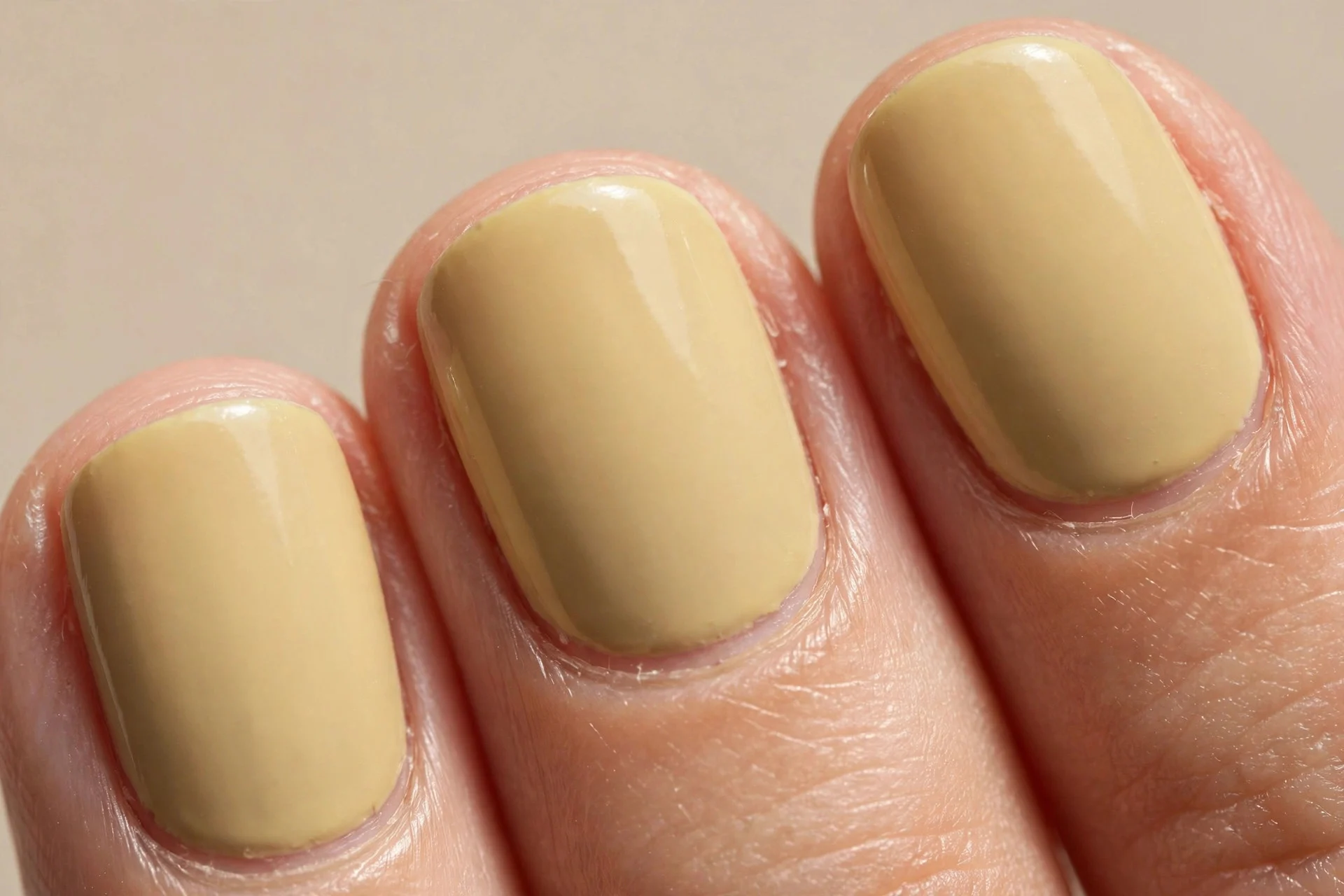 pale Dijon washed mustard crème, short rounded nails, satin glossy finish, no nail art