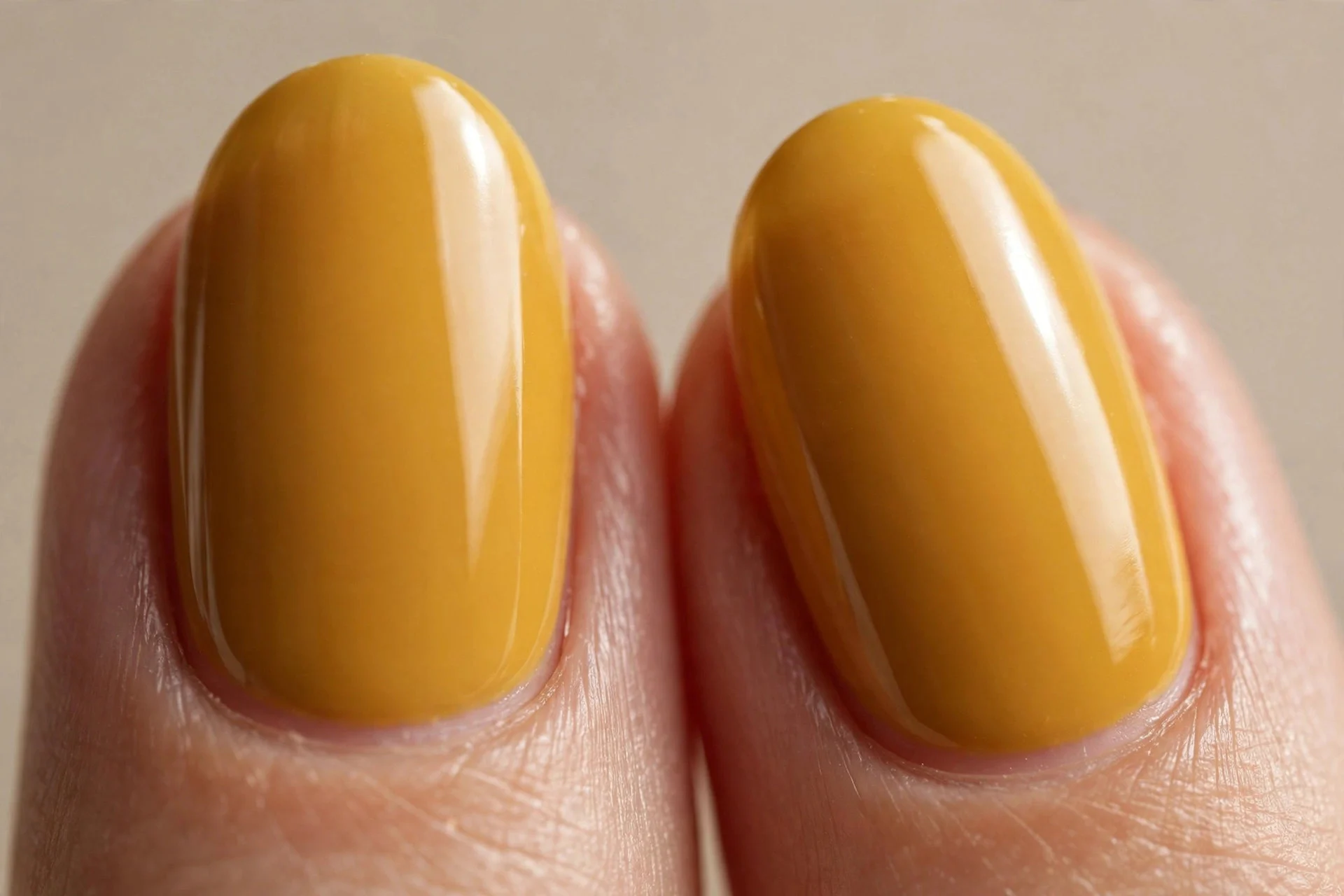 rich golden mustard crème, short almond nails, glossy finish, no nail art