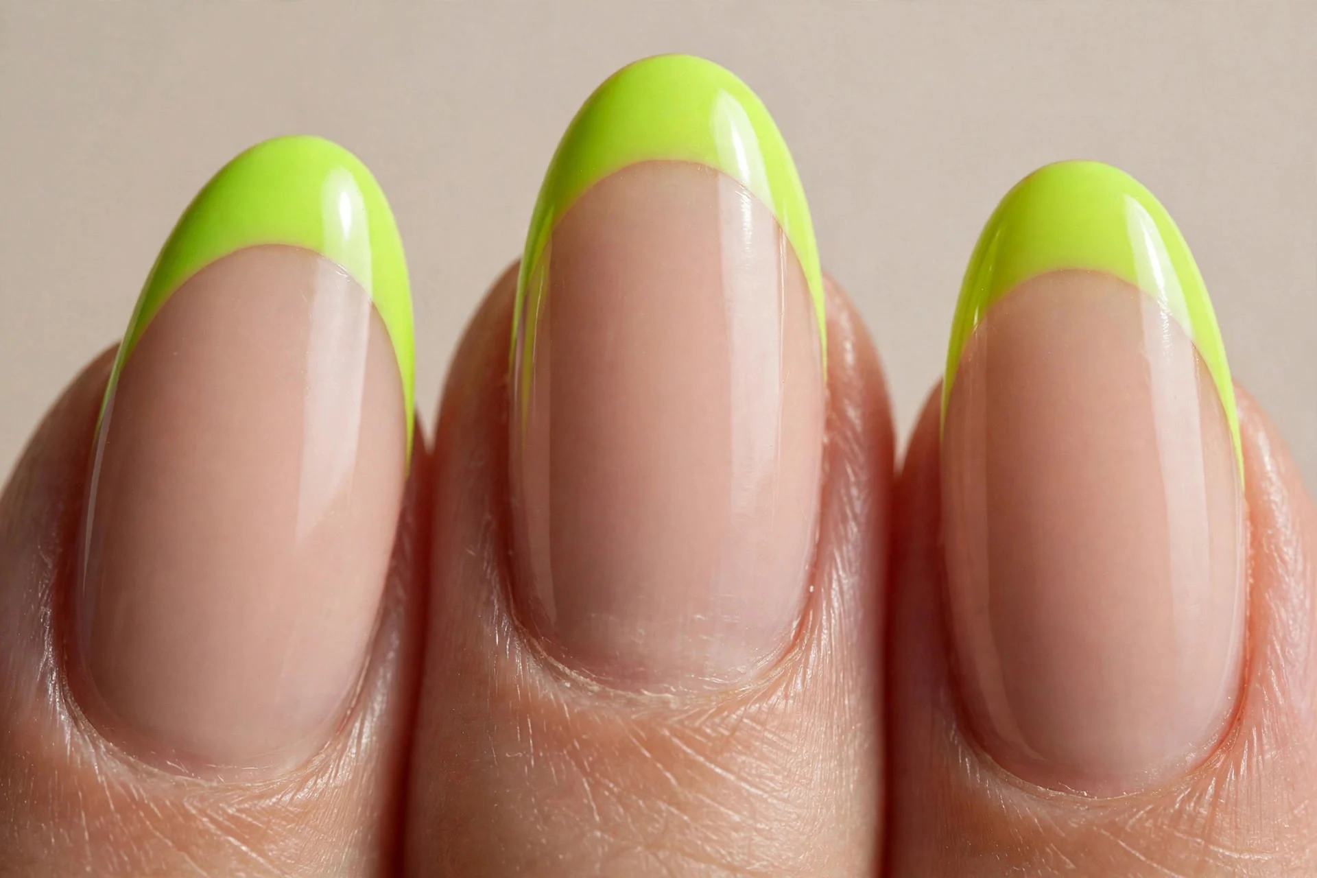 neon lime French tips, nude almond nails, glossy