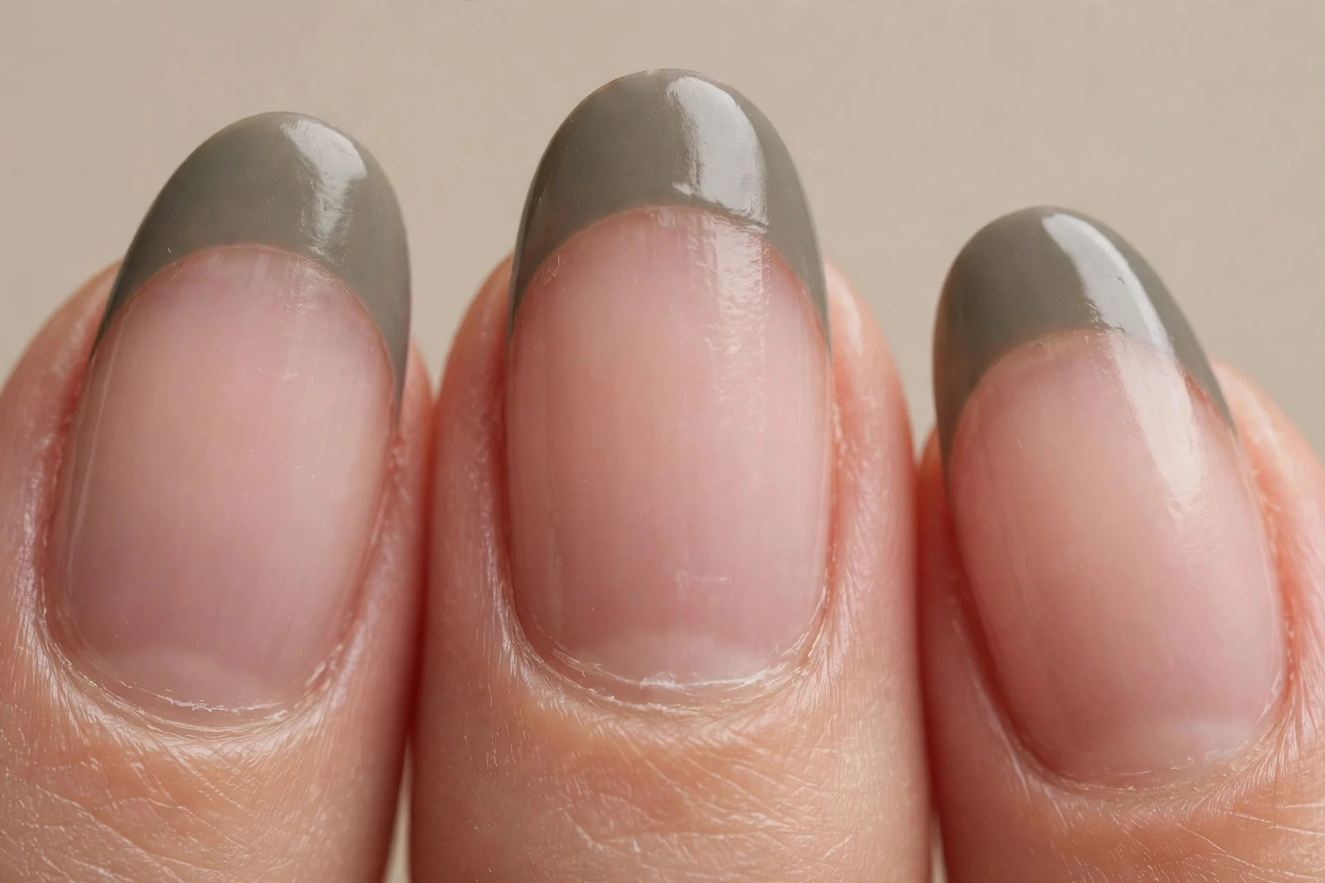 grey-olive French tips, nude base, almond