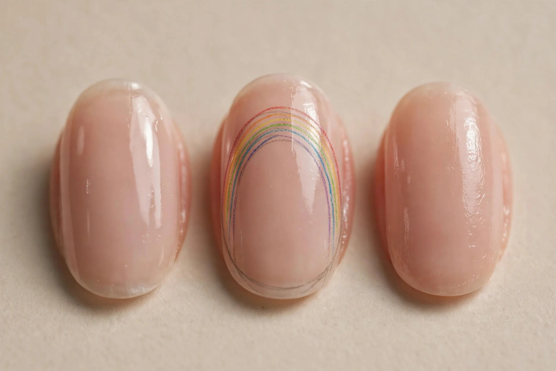 one oval fingernail with thin rainbow outline arches like pencil sketches on glossy nude