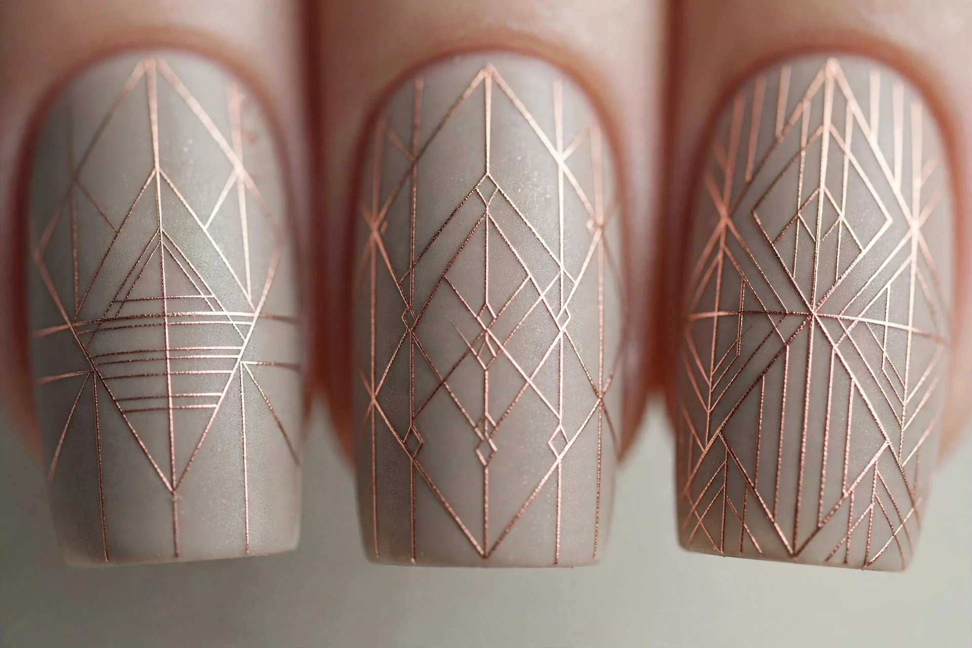 Greige nails with fine rose gold geometric line art, medium square